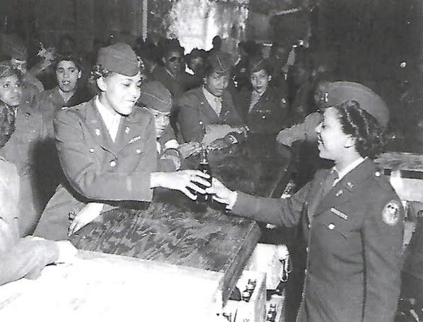 6888th Central Postal Directory Battalion refreshment bar Major Charity Adams at the grand opening of the 6888th Central Postal Directory Battalion refreshment bar.